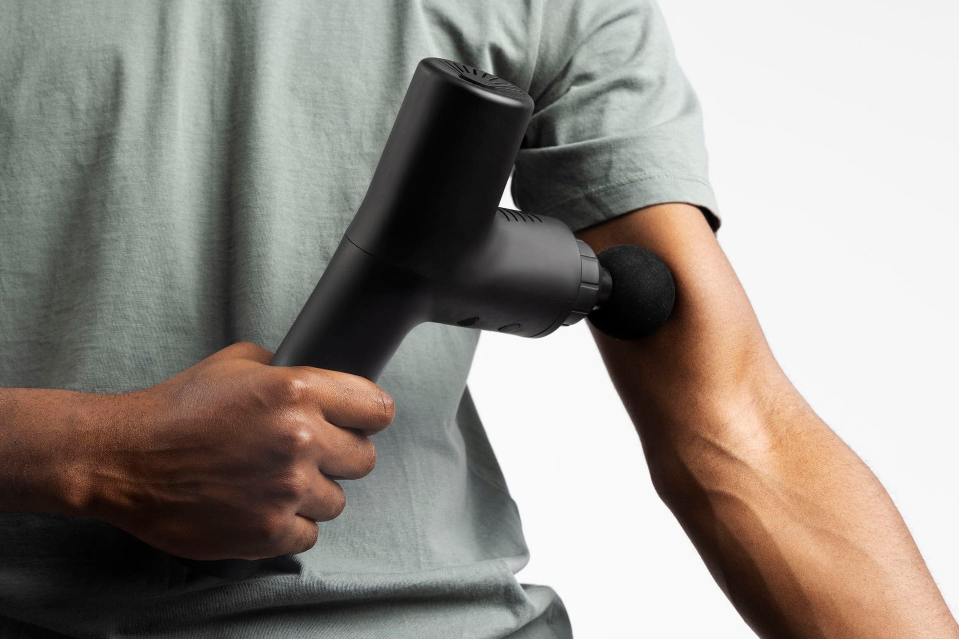 Do Massage Guns Really Work—or Should You Book a Real Massage?
